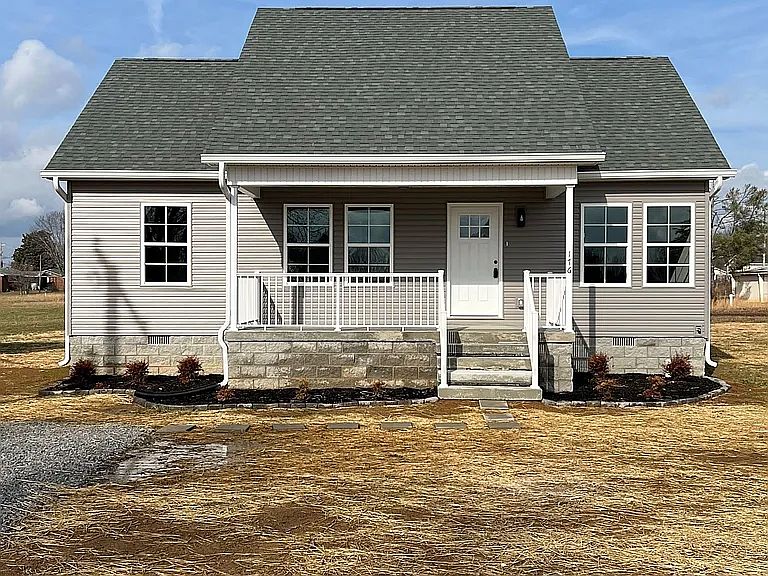 The home now had an added beautiful cement driveway, walkway from driveway to front porch steps, a sidewalk along the house to the back deck, and a cement patio off the back deck