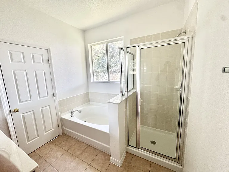 Primary Bathroom with Tub & Shower