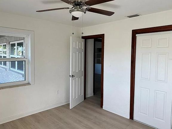 Bedrooms have light/fans and closet. All new paint and flooring