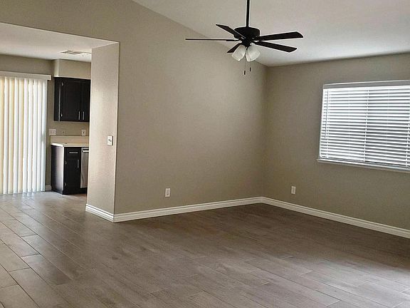 Bright living room with cathedral ceiling