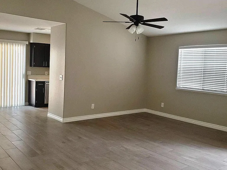 Bright living room with cathedral ceiling