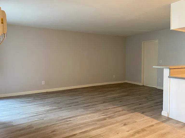 Unit 102 now has white paint on the walls
