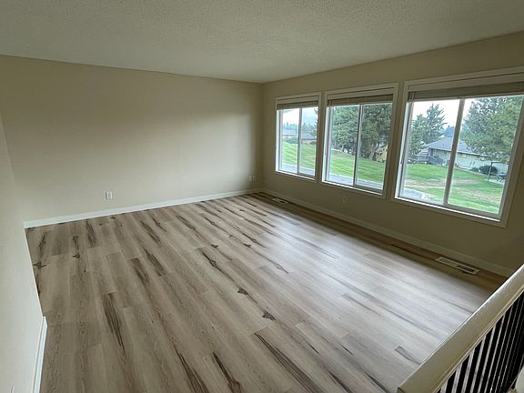 Living Room - big views onto shared neighborhood park