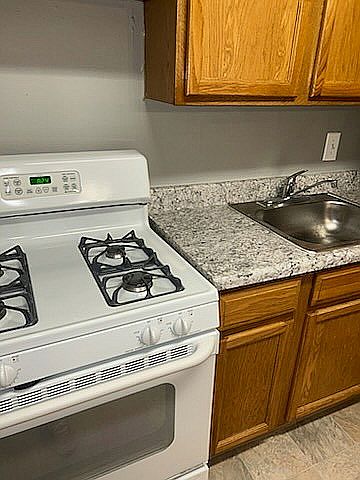 Explore your culinary dreams in this stylish and functional kitchen.