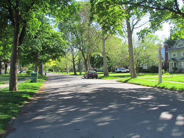 Welcome to Home Acres..a neighborhood with Tree lined street s Sidewalks and Streetlights.