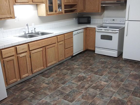 Super kitchen with ample counter space and plenty of cabinets.