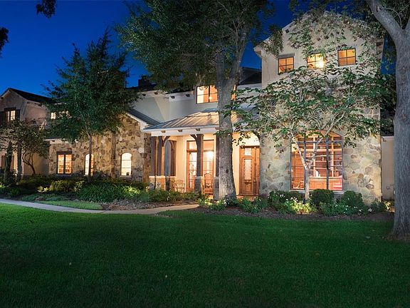 A stunning "Texas Hill Country European" design exudes warmth and charm throughout the home, from the moment you walk up to the stone and stucco elevation you will begin to take note of the many unique custom touches that set this home apart.