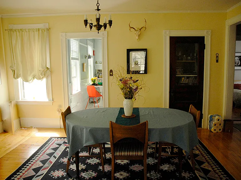 Dining room with built in cabinet- can be opened from kitchen and dining room