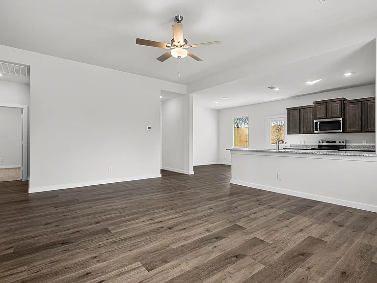 The living room sits right off of the kitchen and dining room.