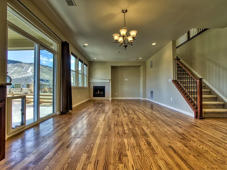 Main level - dining room (14' x 10') and family room with gas fireplace (14' x 14').