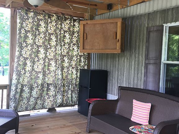 TV in box above the frig