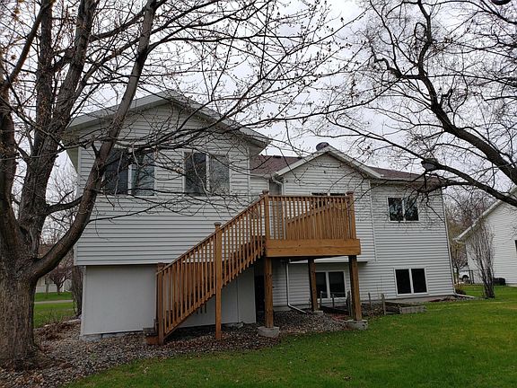 back of home/mature trees