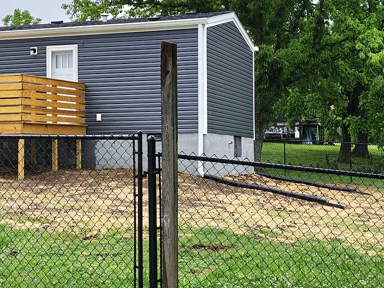 Back yard/back of home.