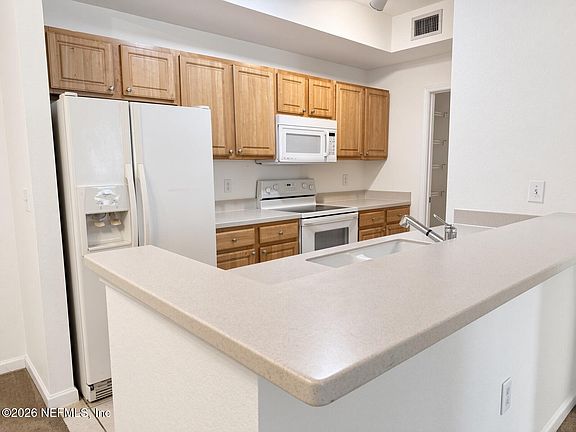 3rd image of 10075 GATE Parkway N #1610