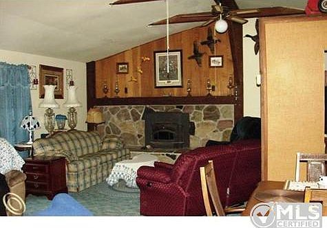 Living room with Stone Fireplace