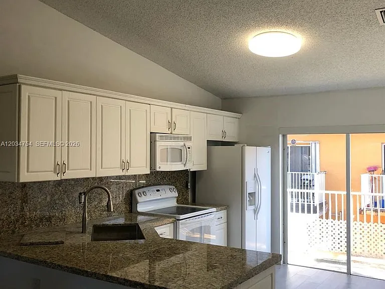 7730 W 34th Ln #14-202 — Photo 3