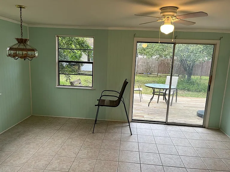 Dinning room with walkout to back deck.