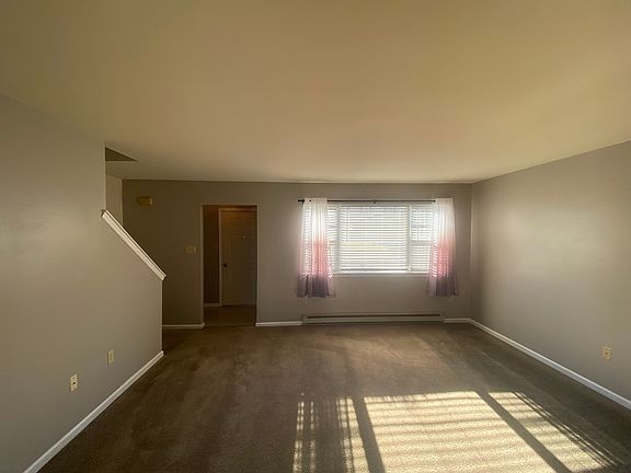 Spacious living room off Entry Foyer with Coat closet