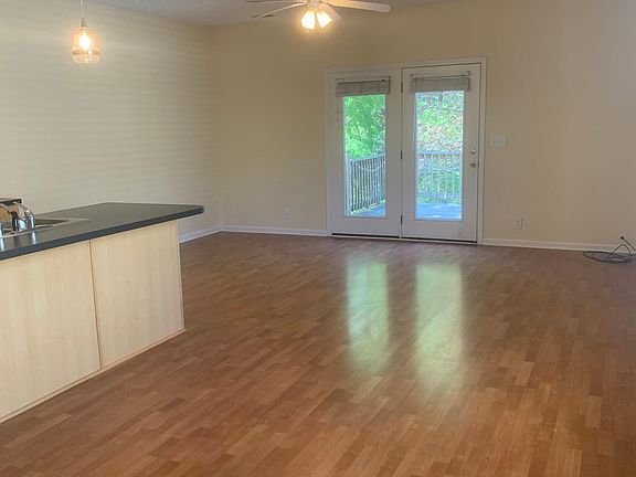 Living area and rear entry from deck