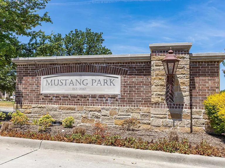 This beautiful home is located in sought after Mustang Park