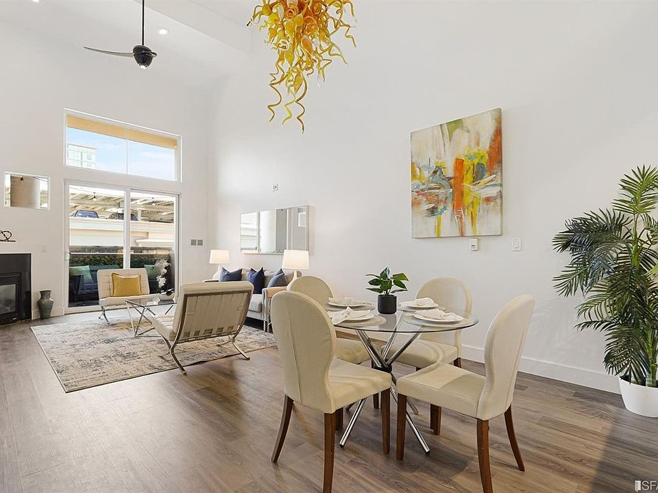 Living room with 20ft tall ceiling and recessed lighting