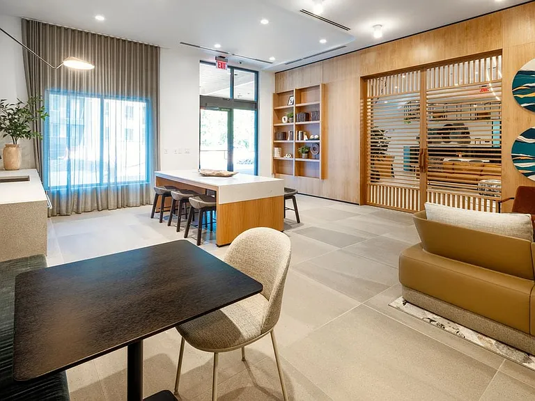 Resident lounge with kitchenette and lounge seating