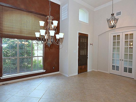 Unique decorative cut out over door with light inside that shines on the outside and inside.
