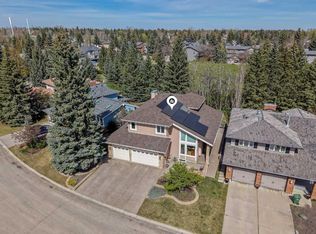 28 NE Woodacres Way SW, Calgary, AB T2W 4W3
