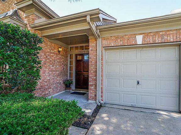 Covered front porch and beautiful front door welcomes you and your guests.