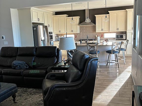 Family room and kitchen bar.