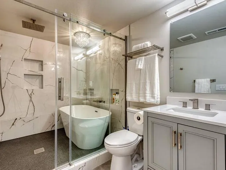 Spa like bathroom with high-end walk-in shower and bathtub to relax