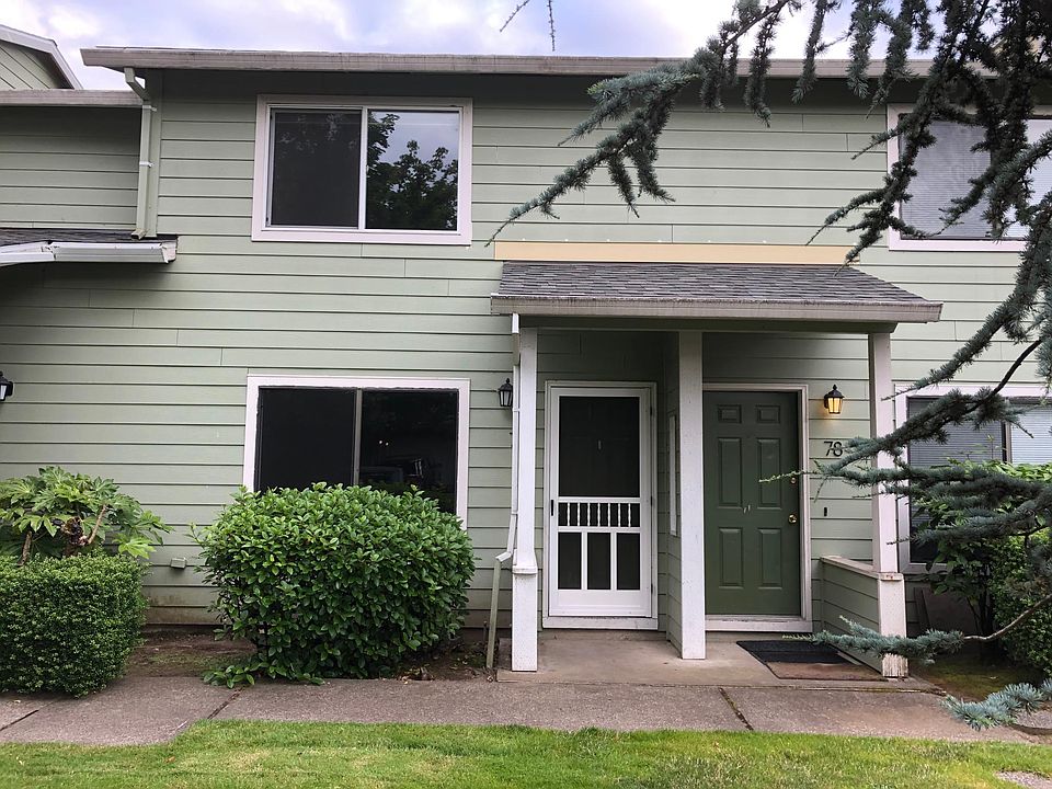 Unit number 77 with white screen door.