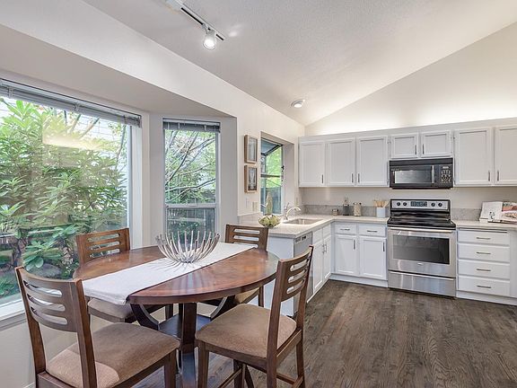 Kitchen breakfast nook. Solid hardwood floors.