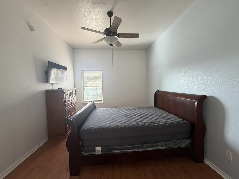 Primary bedroom. There is also a walk in closet next to the bathroom entrance.