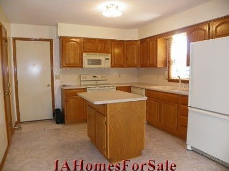 Kitchen - new countertops, backsplash, flooring 2006