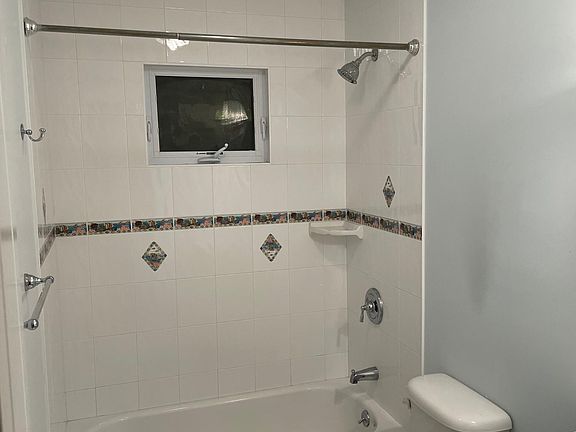 Full newly renovated bathroom in hallway