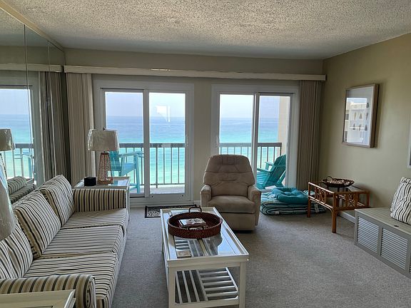 This picture is a view of the Living area.
The sofa has a very comfortable Queen pull out bed. The chest has blankets and pillow stored for the upstairs use. The Chair is a swivel/ recliner.