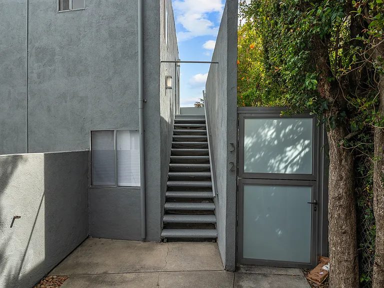 Staircase to Front Door in gated courtyard