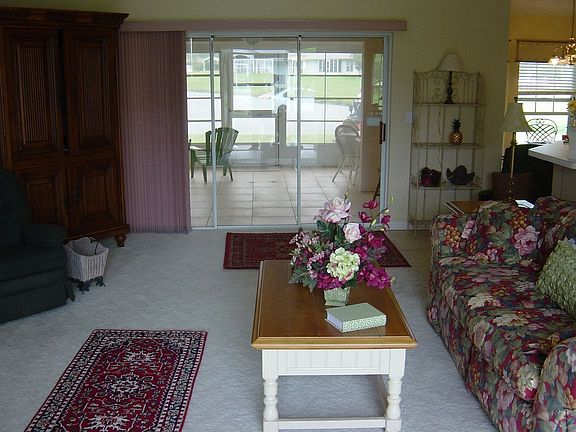 Living/Great room toward sunroom & Lake