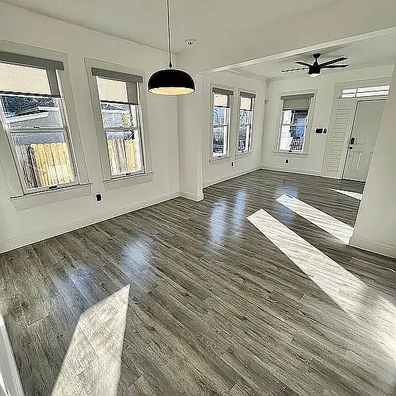 Open plan dining area to family room.