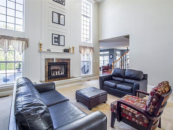 Formal Living Room with tons  of natural light!