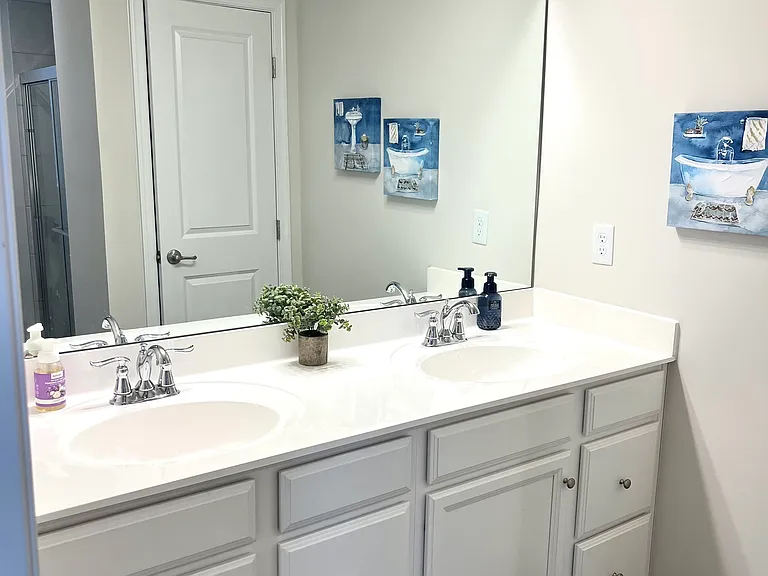 Attached master bathroom with double vanity