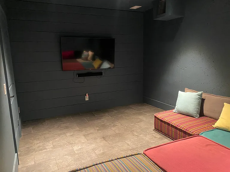 Finished basement, movie den.