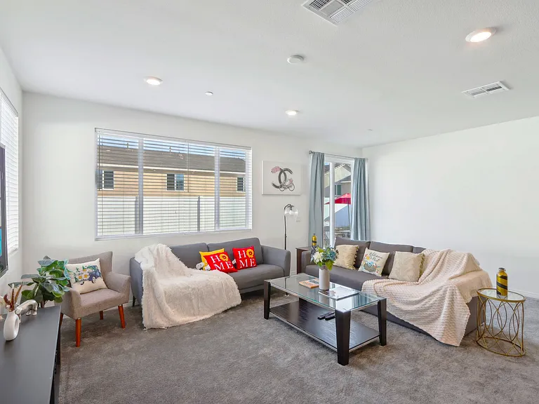 A spacious living room perfect for cozy nights and lively gatherings!