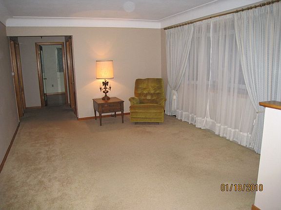 With beautiful cove ceilings