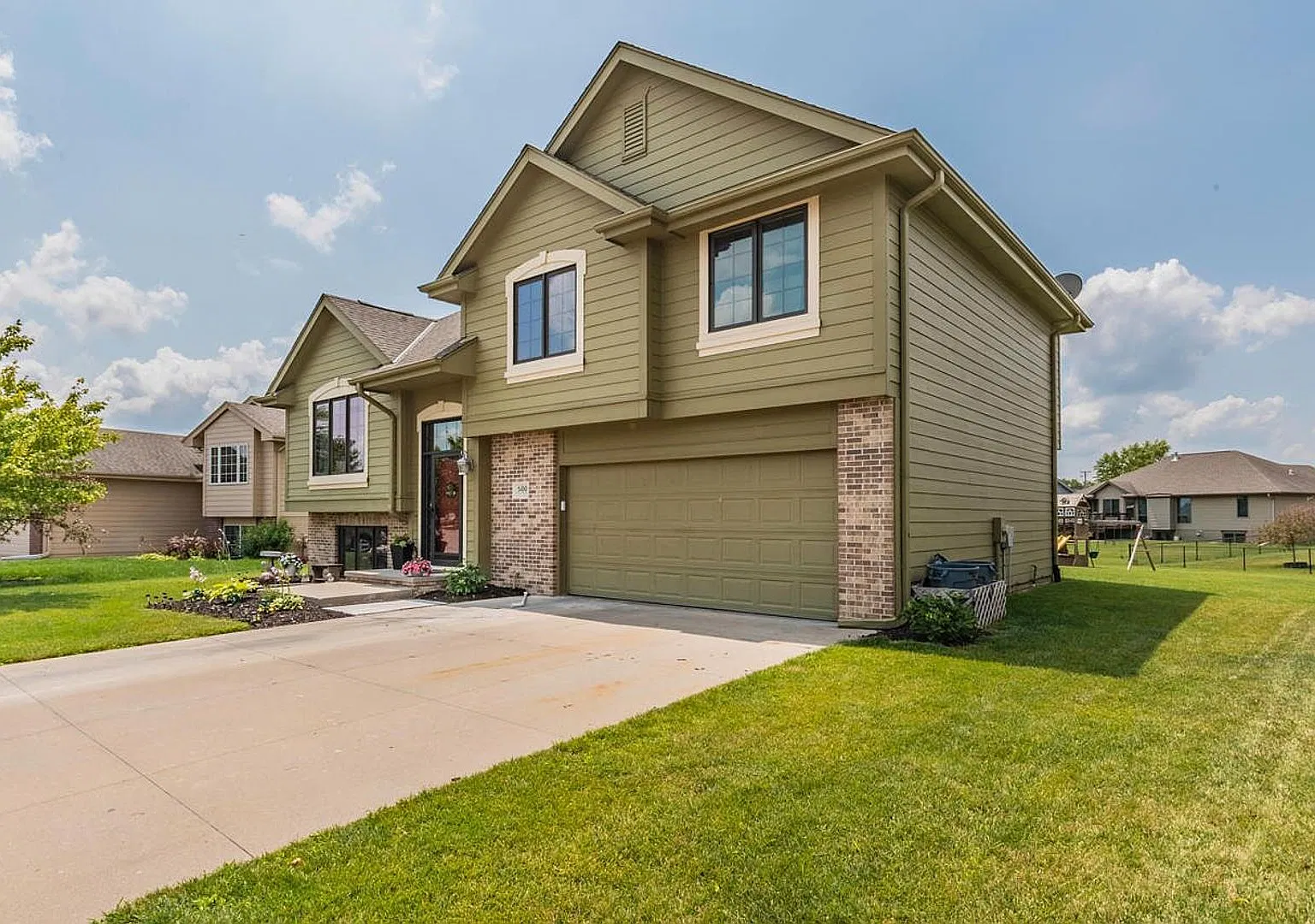 **Spacious 4-Bedroom Home in Lewis Central School District 2-Car Garage & Large Yard** — Photo 2