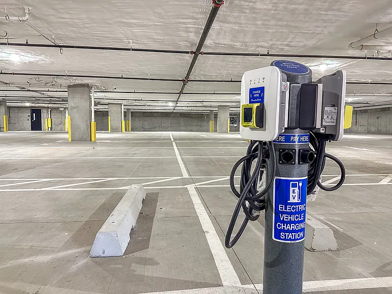 Liberty Duet Apartments, Salt Lake City, Utah; electric vehicle charging station in a parking garage.