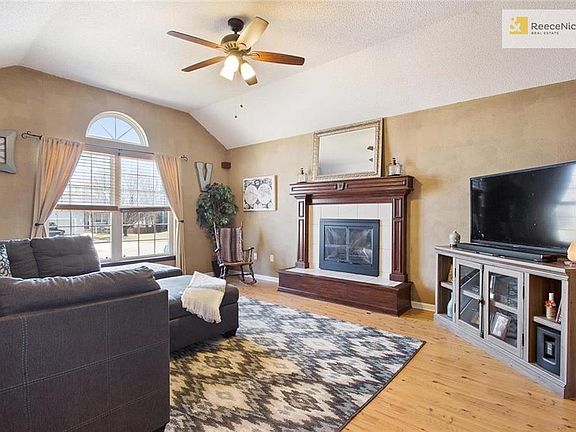 Walk in to lovely living room - cozy and updated colors.