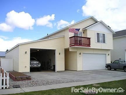 Front
						:
						Shop has 14ft tall automatic garage door.