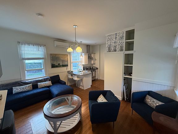 Living and kitchen area. Note, apartment comes unfurnished